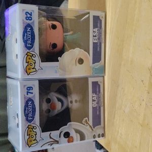 Elsa and Olaf Funko Pops with pop protectors